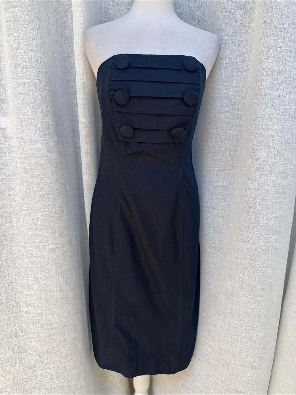 Jillian Arthur 1990s black strapless dress paired with a red bolero crop blazer